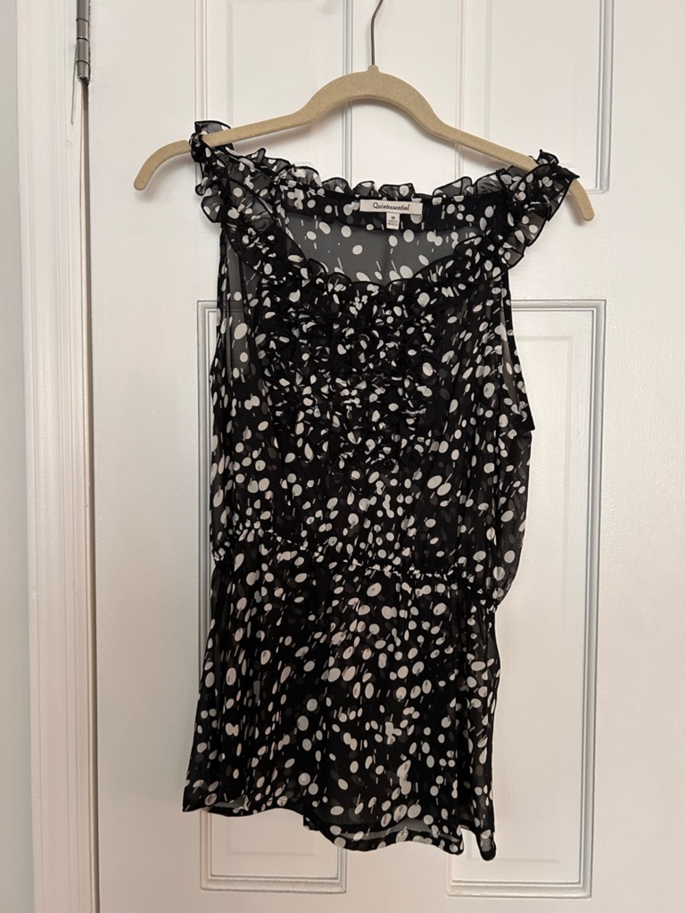 Quintessential Black and White Polka Dot Ruffle Blouse